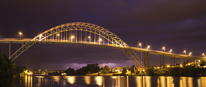 A bridge with night time illumination in Oslo.