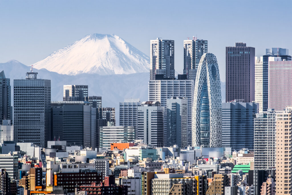 Tokyo`s skyline with the Fuji mountain in the backgound.