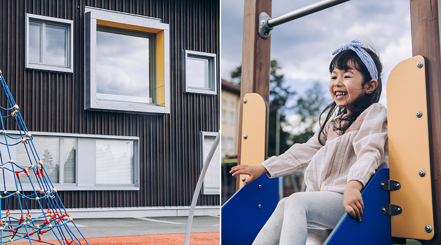 A girl in a slide on a schoole playground.