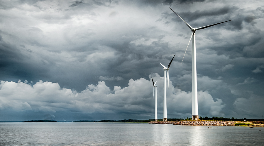 Wind power turbines next to the sea