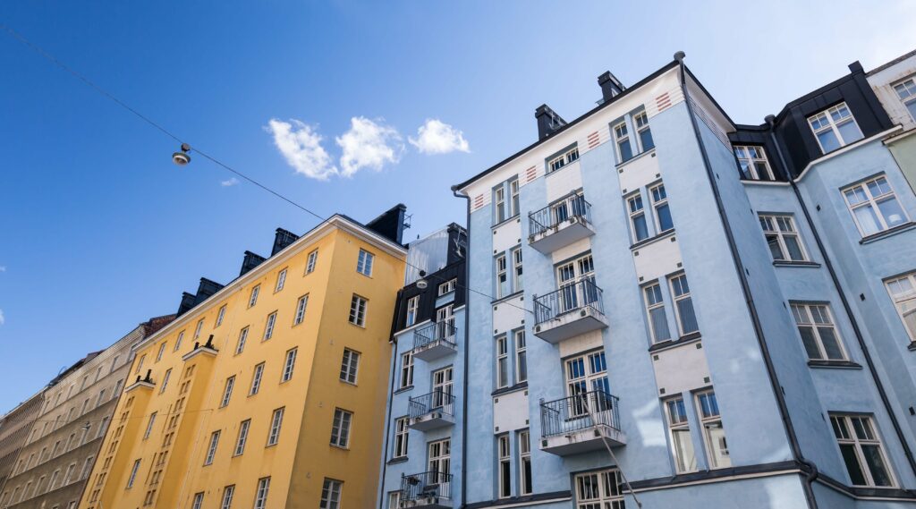 Building walls with windows on blue sky background