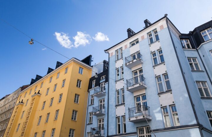 Building walls with windows on blue sky background